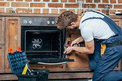 electrician installing an electric oven